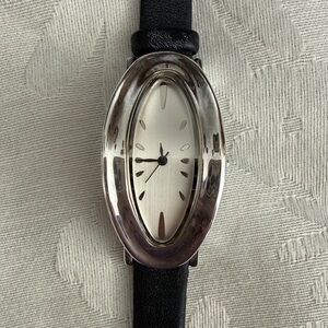 Elegant Oval Silver-Tone Watch with Black Leather Strap